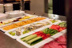 a tray of different types of vegetables on a table at Hotel Tórshavn in Tórshavn