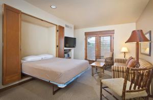Postel nebo postele na pokoji v ubytování WorldMark Taos + 48 fotografií