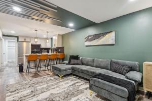 a living room with a couch and a kitchen at 425 Plantation Road SW Smyrna in Smyrna +35 photos