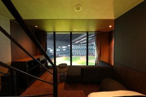 Postel nebo postele na pokoji v ubytování tower eleven hotel