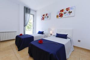 En eller flere senge i et værelse på Villa NINA + 52 billeder