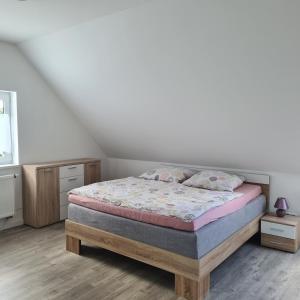 Ένα ή περισσότερα κρεβάτια σε δωμάτιο στο Vorder Rhön Haus 21a