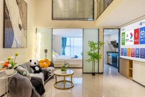 Kuchyň nebo kuchyňský kout v ubytování Duoya International Apartment