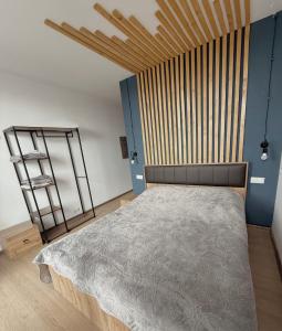 Ένα ή περισσότερα κρεβάτια σε δωμάτιο στο Modern Studio in Hotel Mgzavrebi Block 9 Mountain View