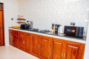 Kuchyň nebo kuchyňský kout v ubytování The Nook at Njiro 39 - 3BR by Kyada Stays