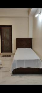a bedroom with a large bed in a room at Nature Retreat in Gangtok
