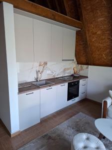 Kuchyň nebo kuchyňský kout v ubytování Monte Village + 4 fotografie