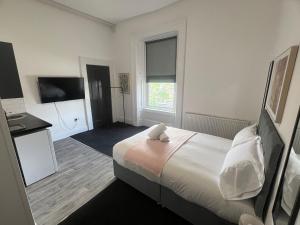 Ένα ή περισσότερα κρεβάτια σε δωμάτιο στο AA Sunderland Apartments +7 φωτογραφίες