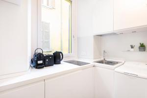 Η κουζίνα ή μικρή κουζίνα στο Easylife - Milan - Carpoforo 5 - Brera