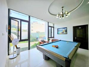 a billiard room with a pool table in it at Kevin Villa Da Nang- 100m from the beach in Da Nang