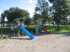 a playground with two slides at La Frontiera in San Feliciano