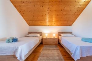 Postel nebo postele na pokoji v ubytování Villa Chervil ZadarVillas + 29 fotografií