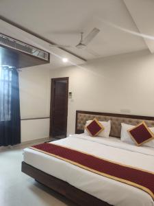 Ένα ή περισσότερα κρεβάτια σε δωμάτιο στο Swagath Inn, Brookefield