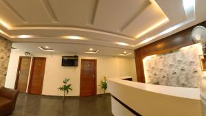 Μια τηλεόραση ή/και κέντρο ψυχαγωγίας στο Swagath Inn, Brookefield +20 φωτογραφίες