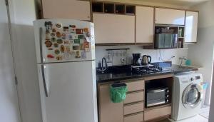 Η κουζίνα ή μικρή κουζίνα στο Apartamento para casal a 10 minutos de BC
