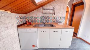 Кухня или мини-кухня в Residenza Marmarole by Ca-Sa Check
 +27 фотографий