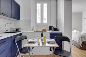 Η κουζίνα ή μικρή κουζίνα στο TBS 339 - Cosy Apartment in Vincennes