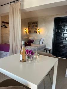 a living room with a white table and a couch at La Ladera Bay View in La Herradura
