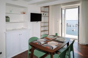 TV a/nebo společenská místnost v ubytování Radici 1937 - Lodge sul mare