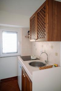 Kuchyň nebo kuchyňský kout v ubytování Radici 1937 - Lodge sul mare + 8 fotografií