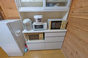 Kuchyň nebo kuchyňský kout v ubytování グリーンビューコテージ那須