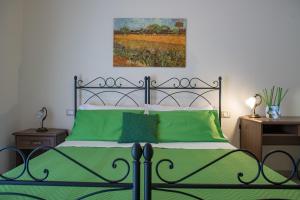 Posteľ alebo postele v izbe v ubytovaní B&B Palazzo Tornabene