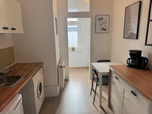 Kuchyň nebo kuchyňský kout v ubytování Einfaches Appartement "Nicky" mit 2 Zimmern