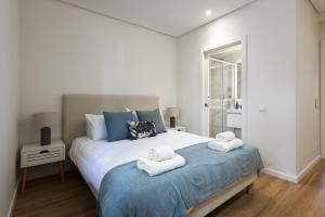 En eller flere senge i et værelse på Mira Mar 1 - Near the beach by HD