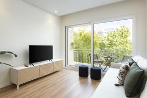 Et tv og/eller underholdning på Mira Mar 1 - Near the beach by HD