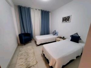 Кровать или кровати в номере La bourgeoisie house flat +7 фотографий