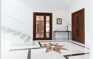 a room with a star on the floor at The Gorge House in Ronda