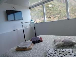 Ένα ή περισσότερα κρεβάτια σε δωμάτιο στο New apartments "Sea view" with kitchen and private bathroom