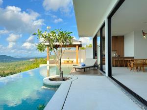 Hồ bơi trong/gần Anzhu Seamate Villa Samui