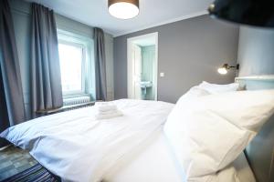 Postel nebo postele na pokoji v ubytování B&B Zum Schleif