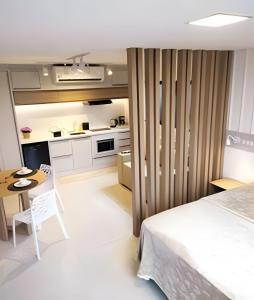 Kuchyň nebo kuchyňský kout v ubytování Loft Feldmann localização estratégica