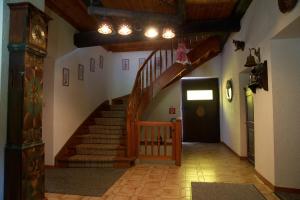 a hallway with a spiral staircase in a house at Appartements Grafhube in Verditz