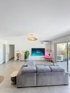 Χώρος καθιστικού στο T3 avec loggia, Clim et parking - Proche Montpellier