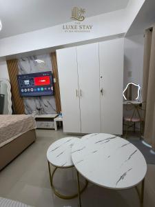 Kuchyň nebo kuchyňský kout v ubytování The Luxe Stay at Sea Residences