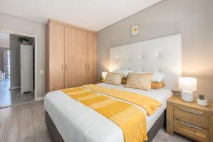 Ένα ή περισσότερα κρεβάτια σε δωμάτιο στο Shelly Cove - Seaside Retreat