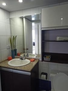 Ένα μπάνιο στο Bello Apartamento playa lido