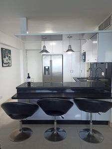 Η κουζίνα ή μικρή κουζίνα στο Bello Apartamento playa lido