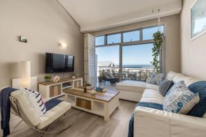 Χώρος καθιστικού στο Shelly Cove - Seaside Retreat