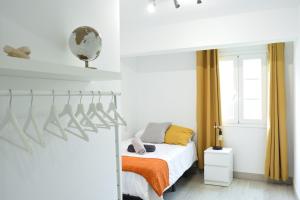 a bedroom with a bed and a window at Casa Calma III in Tacoronte +15 photos