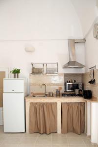 Kjøkken eller kjøkkenkrok på Il Pumo Dorato