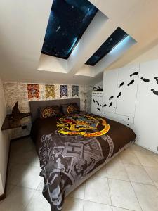 Ένα ή περισσότερα κρεβάτια σε δωμάτιο στο La casa magica