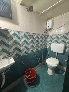 Koupelna v ubytování Kapoor dormitory