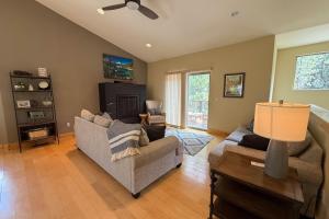 a living room with a couch and a table at Tahoe Boulders in Stateline