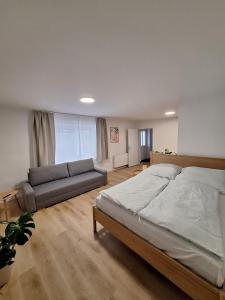 Кровать или кровати в номере City Apartment