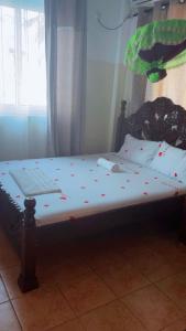 Giường trong phòng chung tại Bathaf plaza