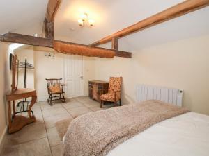 Postel nebo postele na pokoji v ubytování Millstone Cottages - Millstone Cottage